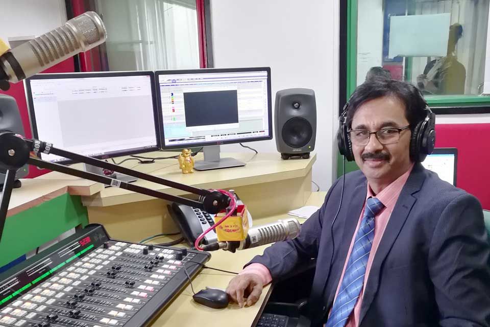Dr. Singhvi in the Radio Mirchi studio, Indore