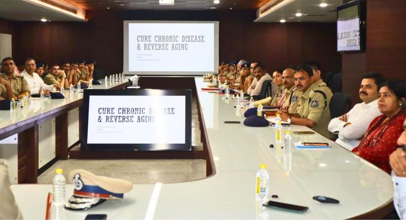 Officers of the Ahmedabad Police Commissionerate attending Dr. Singhvi's talk 'Cure Chronic Disease & Reverse Aging'